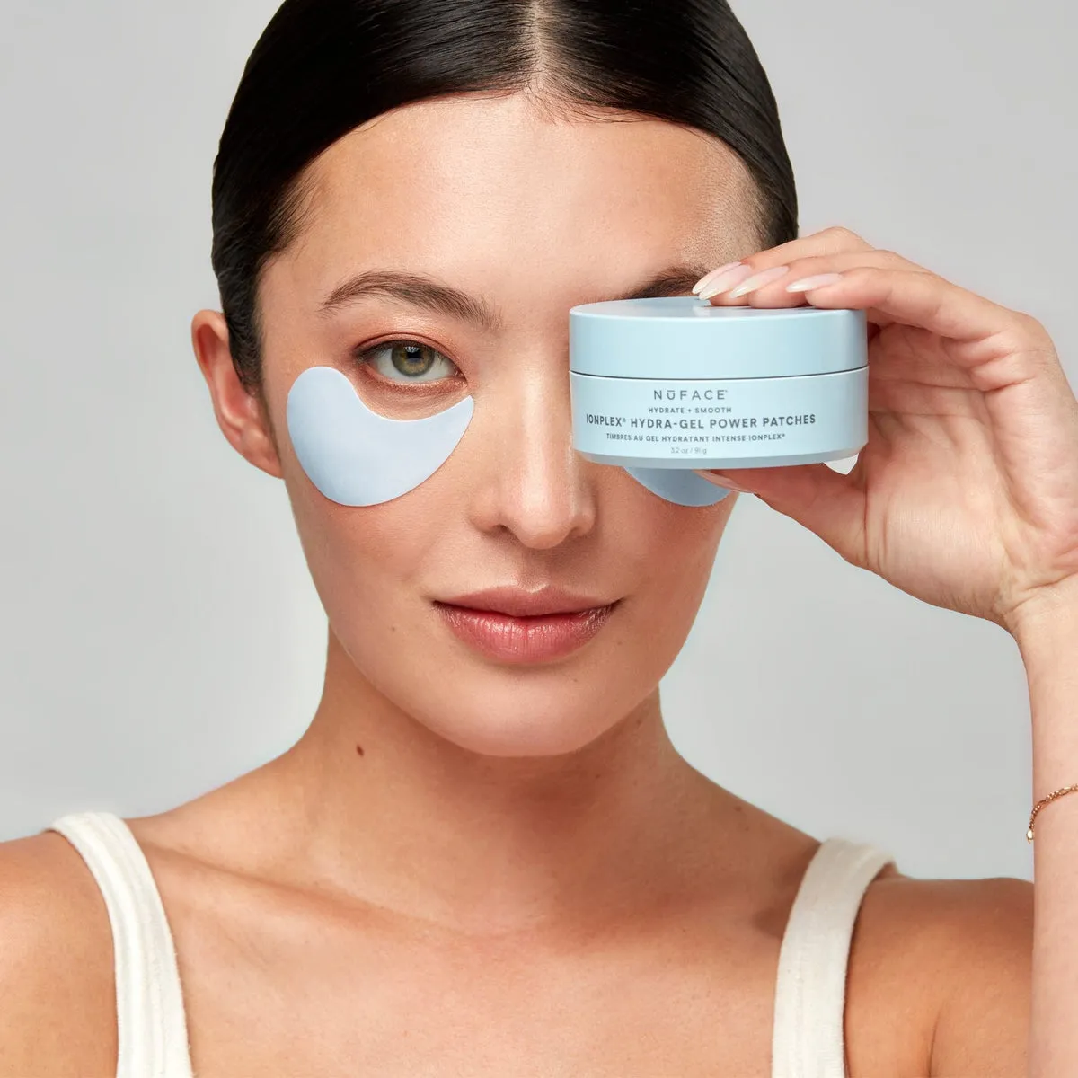 NuFACE IonPlex® Hydra-Gel Power Patches lifestyle photo showing the product in use
